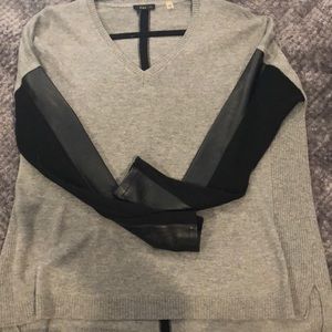 Gray sweater with leather sleeves